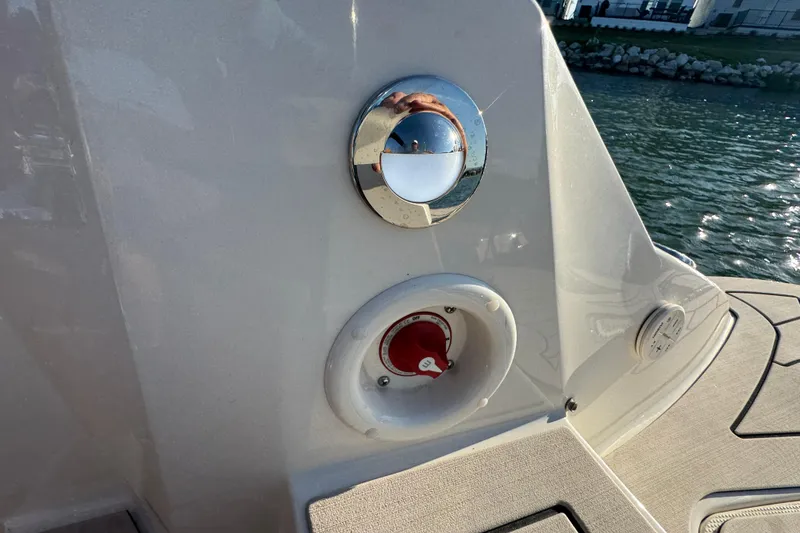 Slide: The Image of 2021 Stingray 192 SC boat detail with water backdrop. - 27