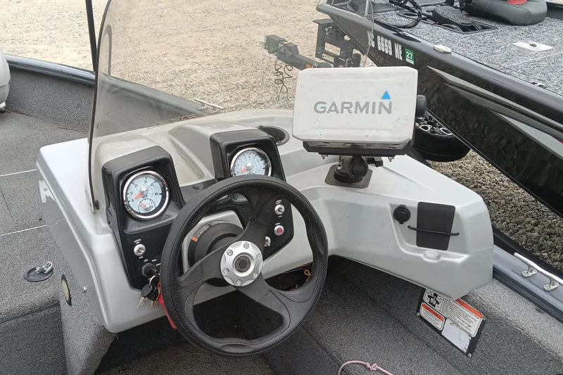 Slide: The Image of 2019 Tracker Pro Guide V-16 SC boat dashboard with Garmin GPS and gauges. - 11