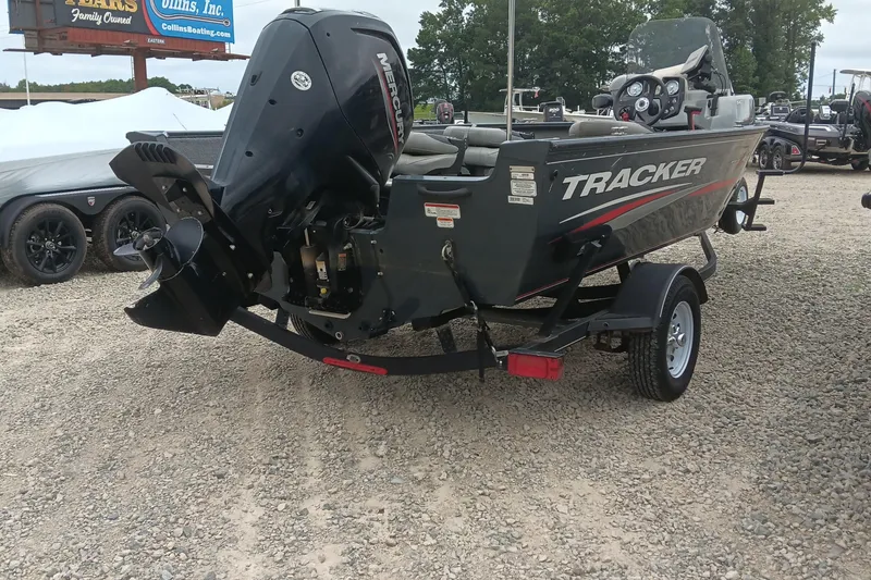 Slide: The Image of 2019 Tracker Pro Guide V-16 SC boat with Mercury engine on trailer. - 3