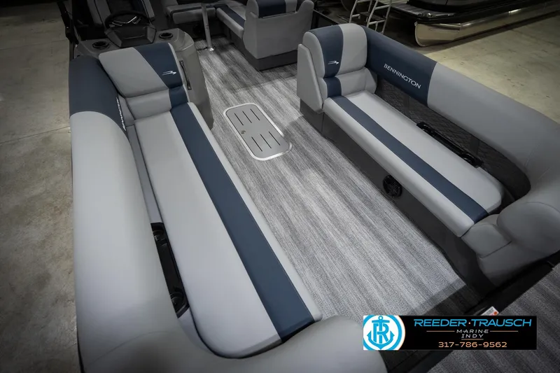Slide: The Image of 2026 Bennington 23 SLJ pontoon boat interior with gray and blue seating. - 12