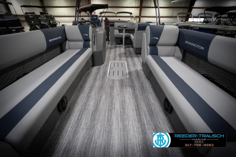 Slide: The Image of 2026 Bennington 23 SLJ pontoon boat interior with plush seating and modern helm. - 15