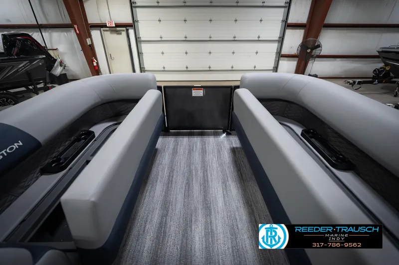 Slide: The Image of 2026 Bennington 23 SLJ boat interior with gray seating and modern design. - 21