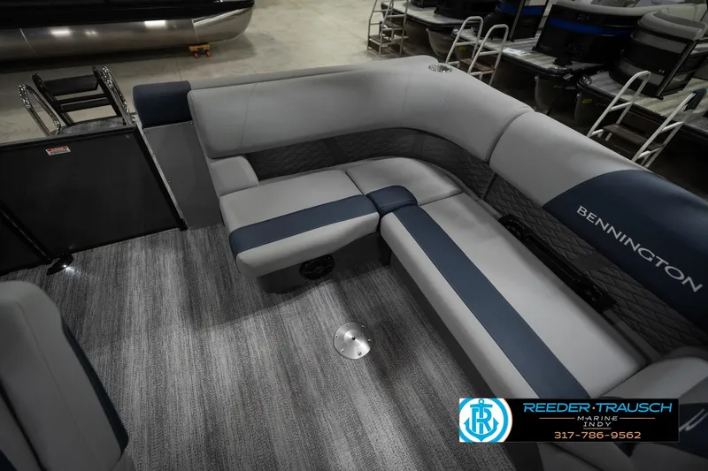 Slide: The Image of 2026 Bennington 23 SLJ pontoon boat interior with gray seating and table. - 27