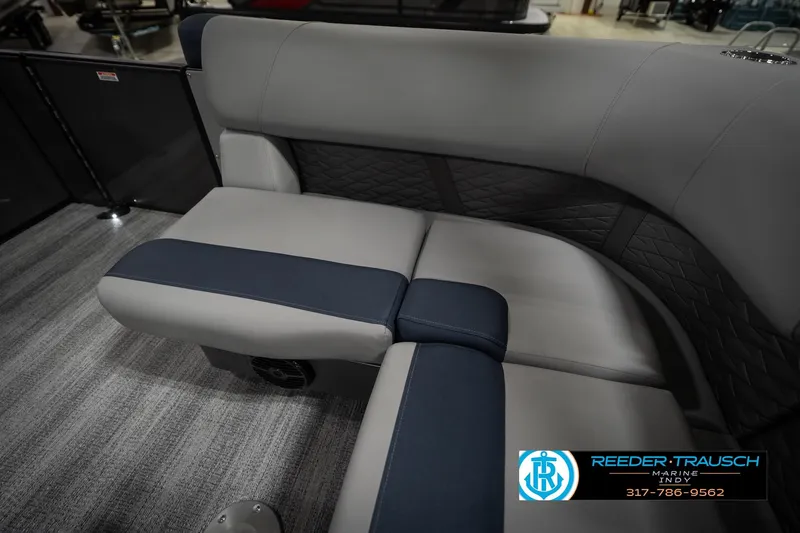 Slide: The Image of 2026 Bennington 23 SLJ pontoon boat interior with gray and blue seating. - 28