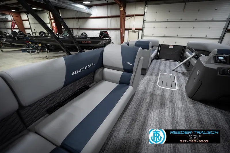Slide: The Image of 2026 Bennington 23 SLJ boat interior with stylish seating and storage compartment. - 30