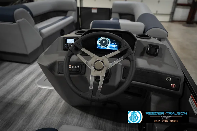 Slide: The Image of 2026 Bennington 23 SLJ boat interior with luxurious seating and storage compartments. - 32