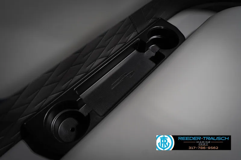 Slide: The Image of Close-up of 2026 Bennington 23 SLJ boat cup holder with Reeder-Trausch Marine logo. - 49
