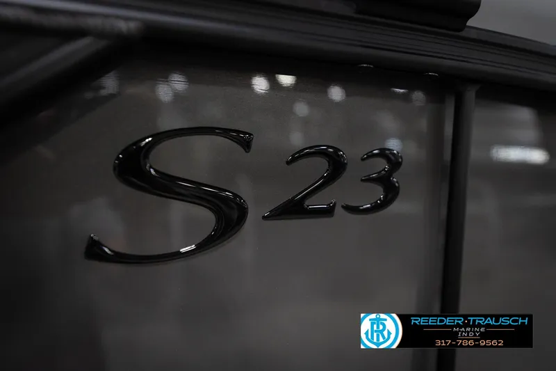 Slide: The Image of 2026 Bennington 23 SLJ boat with Reeder-Trausch Marine logo and contact number. - 54