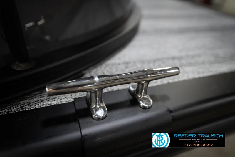 Slide: The Image of 2026 Bennington 23 SLJ boat logo with Reeder Trausch Marine contact details. - 55