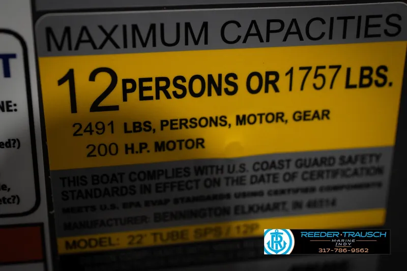 Slide: The Image of Bennington 23 SLJ 2026 boat cleat with engraved branding, Reeder-Trausch Marine logo visible. - 59