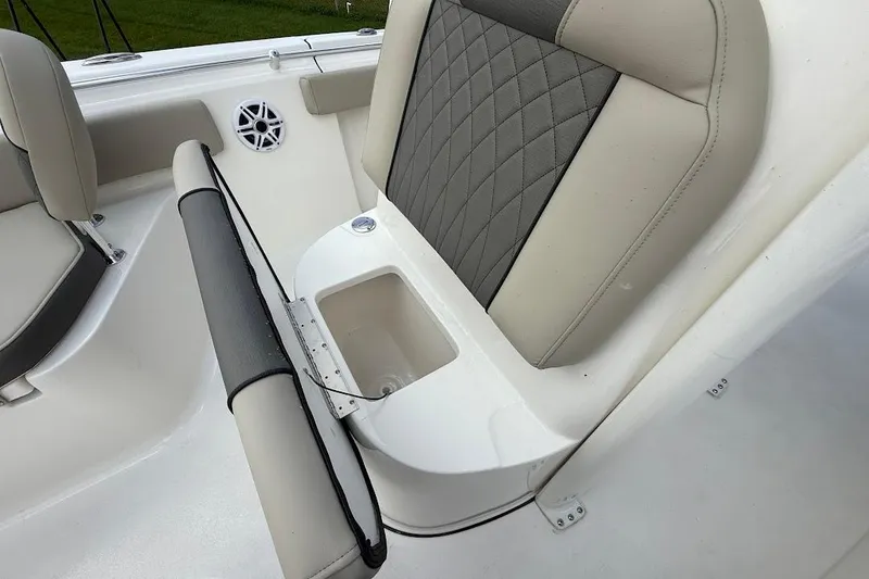 Slide: The Image of 2026 Key West 219 FS boat seat with storage compartment and speaker. - 20