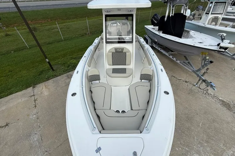 Slide: The Image of 2026 Key West 219 FS boat with spacious seating and modern design. - 25
