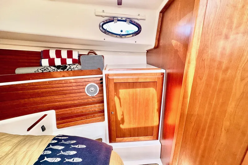 Slide: The Image of Additional Storage Lockers on Port and Starboard - 43