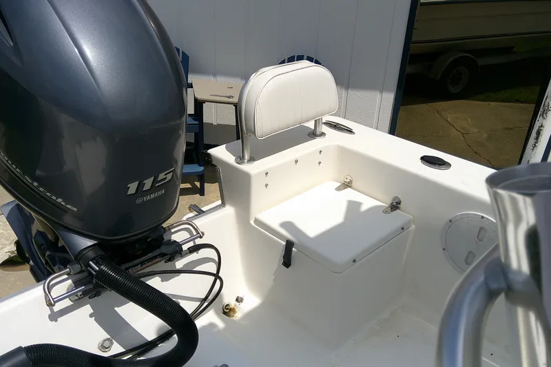 Slide: The Image of 2015 KenCraft 2060 BAYRIDER boat with Yamaha 115 engine, featuring a white seating area. - 11