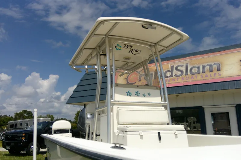 Slide: The Image of 2015 KenCraft 2060 BAYRIDER boat at dealership under clear sky. - 14