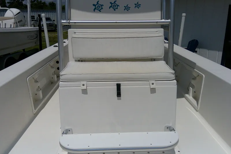 Slide: The Image of 2015 KenCraft 2060 BAYRIDER boat interior with cushioned seating and storage. - 16