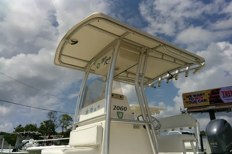 Slide: The Image of 2015 KenCraft 2060 BAYRIDER boat with T-top under cloudy sky. - 22