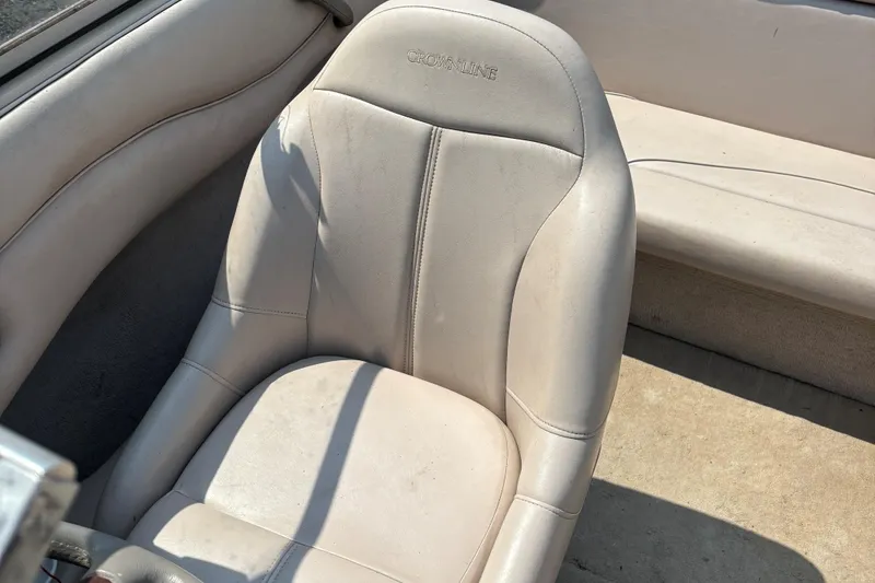Slide: The Image of Crownline 18' 2001 boat interior with beige seating and upholstery. - 14