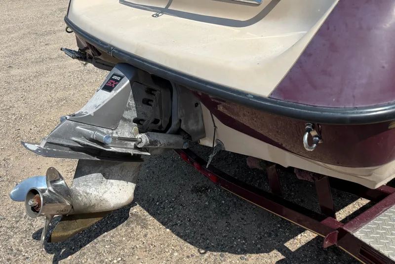 Slide: The Image of Rear view of a 2001 Crownline 18' boat with Volvo Penta SX outdrive. - 4