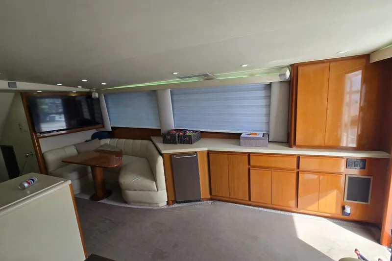 Slide: The Image of Bunk beds with teal bedding in 1998 Viking 58 Convertible yacht cabin. - 17