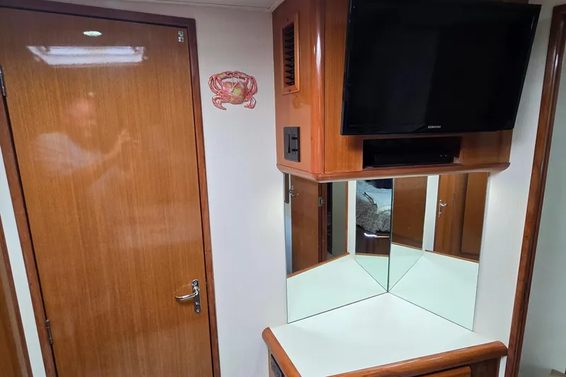 Slide: The Image of Open electrical panel on 1998 Viking 58 Convertible yacht, showcasing interior components. - 31