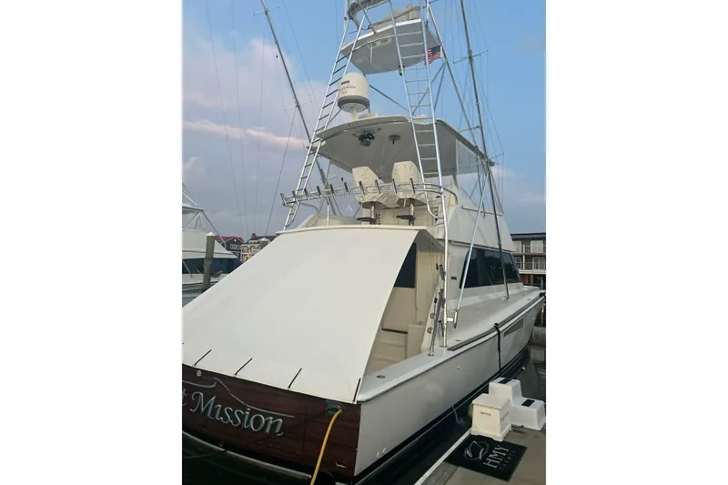 Slide: The Image of Interior of salon with seating, dinette table, and cabinetry. - 8