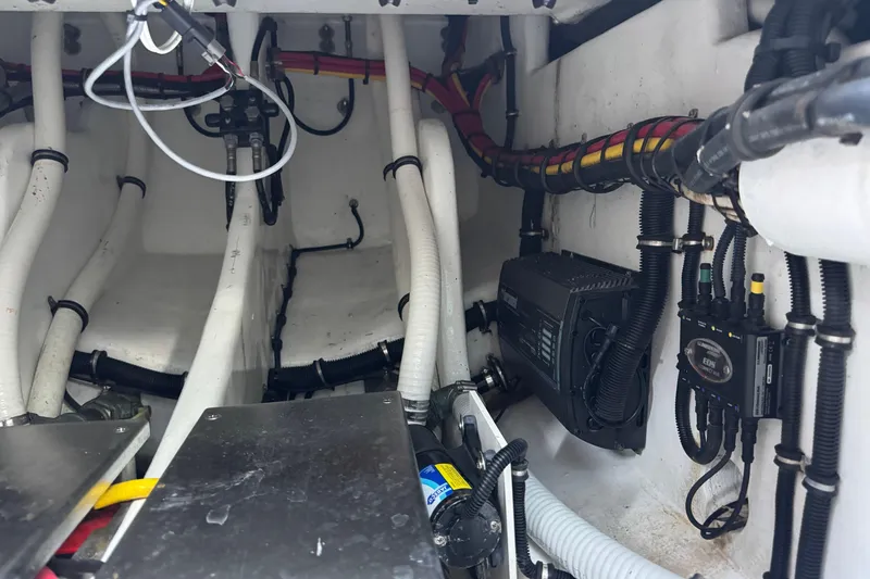 Slide: The Image of 2024 Nor-Tech 400 Supersport boat interior with luxurious seating and sleek design. - 20