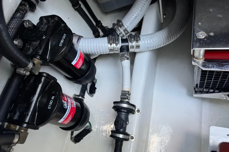 Slide: The Image of 2024 Nor-Tech 400 Supersport boat with four powerful outboard engines, rear view. - 26