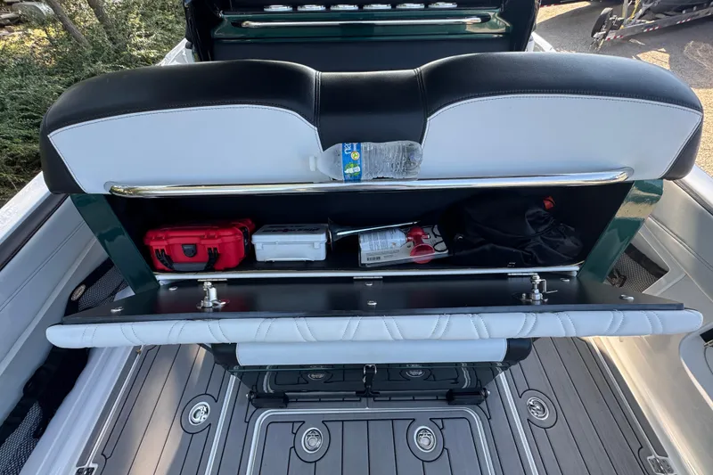 Slide: The Image of 2024 Nor-Tech 400 Supersport boat on trailer, side view, outdoors. - 28