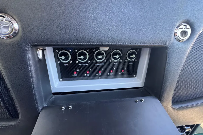 Slide: The Image of 2024 Nor-Tech 400 Supersport boat on trailer at sunset, side view. - 32