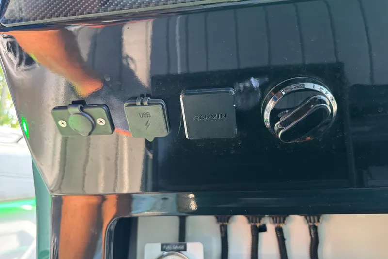 Slide: The Image of 2024 Nor-Tech 400 Supersport boat on trailer in sunny outdoor setting. - 34