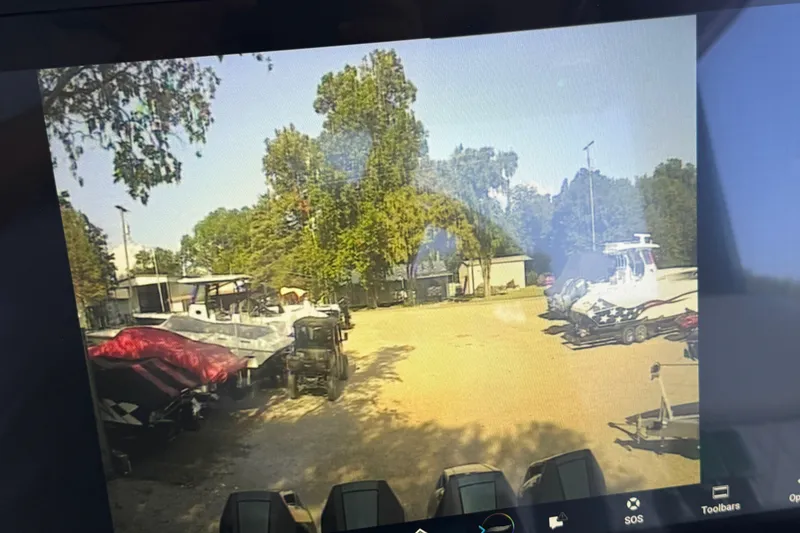 Slide: The Image of 2024 Nor-Tech 400 Supersport with four powerful outboard engines, rear view. - 38