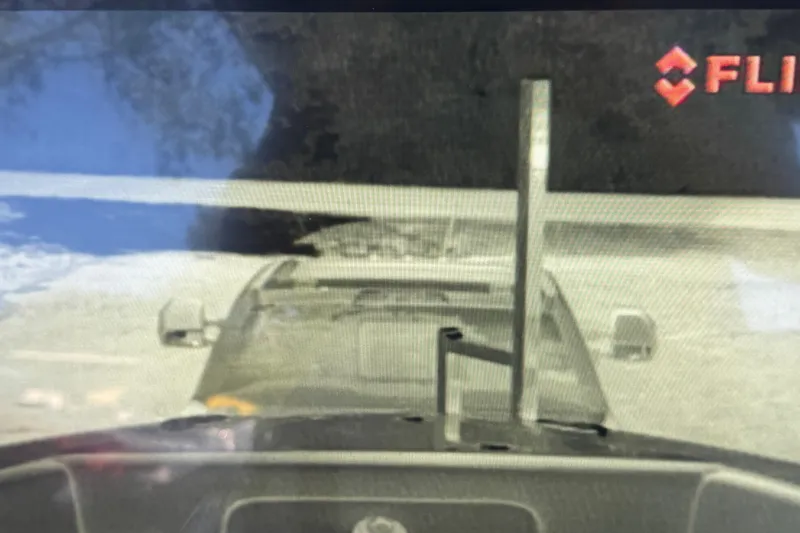 Slide: The Image of 2024 Nor-Tech 400 Supersport boat with powerful outboard engines on a trailer. - 39