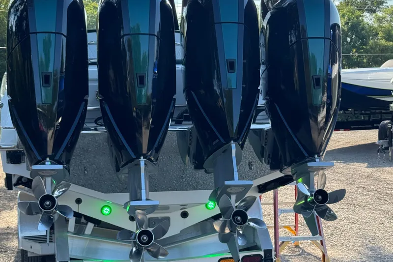 Slide: The Image of Engine compartment of 2024 Nor-Tech 400 Supersport with hoses and filters visible. - 48