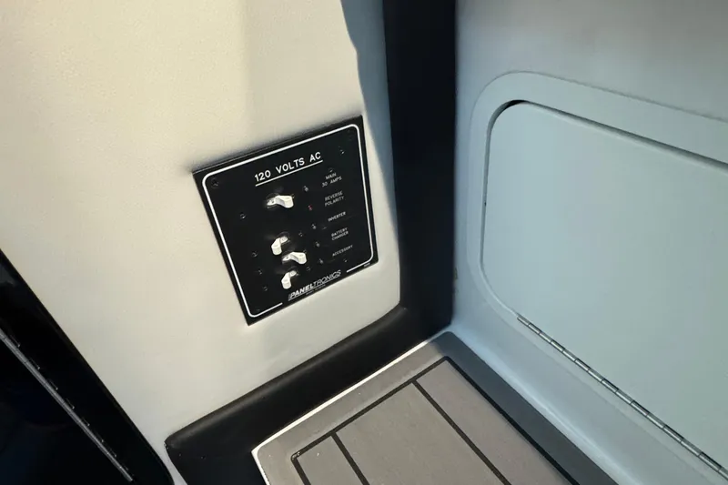 Slide: The Image of 2024 Nor-Tech 400 Supersport boat interior with speakers and sleek design. - 57