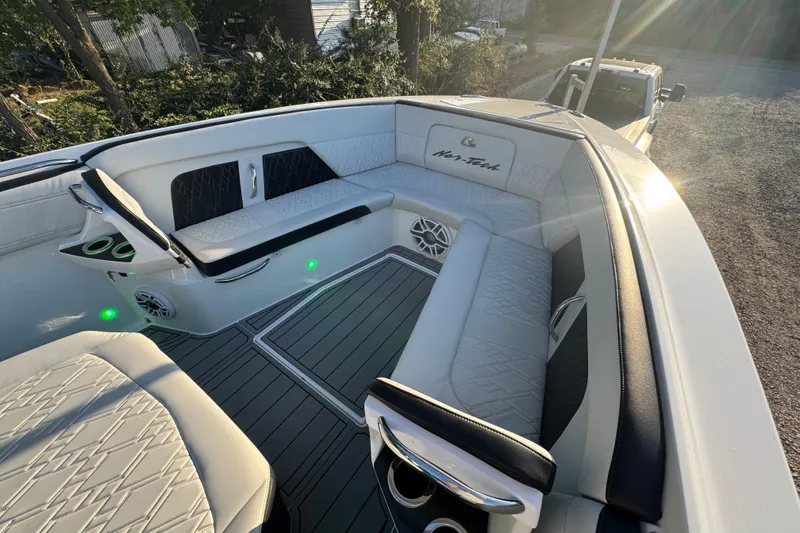Slide: The Image of 2024 Nor-Tech 400 Supersport boat interior with sleek design and modern features. - 75