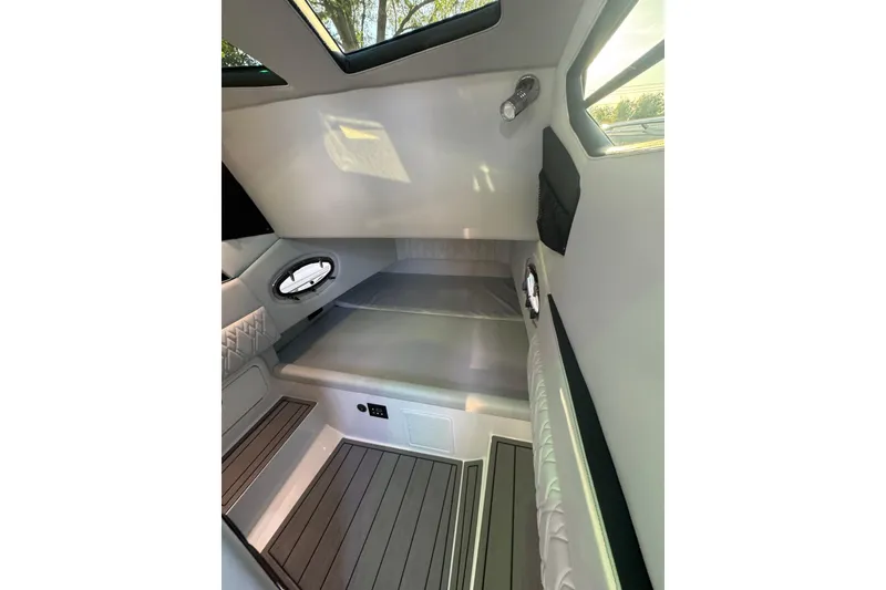 Slide: The Image of 2024 Nor-Tech 400 Supersport boat with advanced lighting and speaker system. - 83