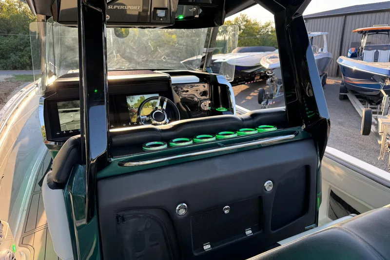 Slide: The Image of 2024 Nor-Tech 400 Supersport cockpit with modern dashboard and steering wheel. - 91