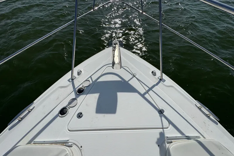 Slide: The Image of Bow view of a 2008 Cruisers Yachts 395 Motoryacht on the water. - 6