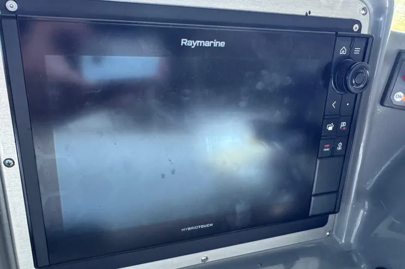 Slide: The Image of Raymarine navigation system on 2008 Cruisers Yachts 395 Motoryacht dashboard. - 19