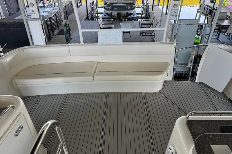 Slide: The Image of 2008 Cruisers Yachts 395 Motoryacht interior with seating and deck view. - 23