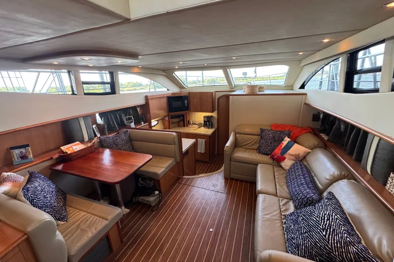 Slide: The Image of Luxurious interior of 2008 Cruisers Yachts 395 Motoryacht with elegant seating and dining area. - 35