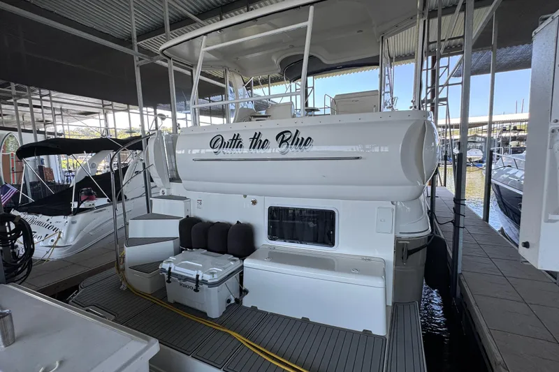 Slide: The Image of 2008 Cruisers Yachts 395 Motoryacht docked in marina, rear view. - 7
