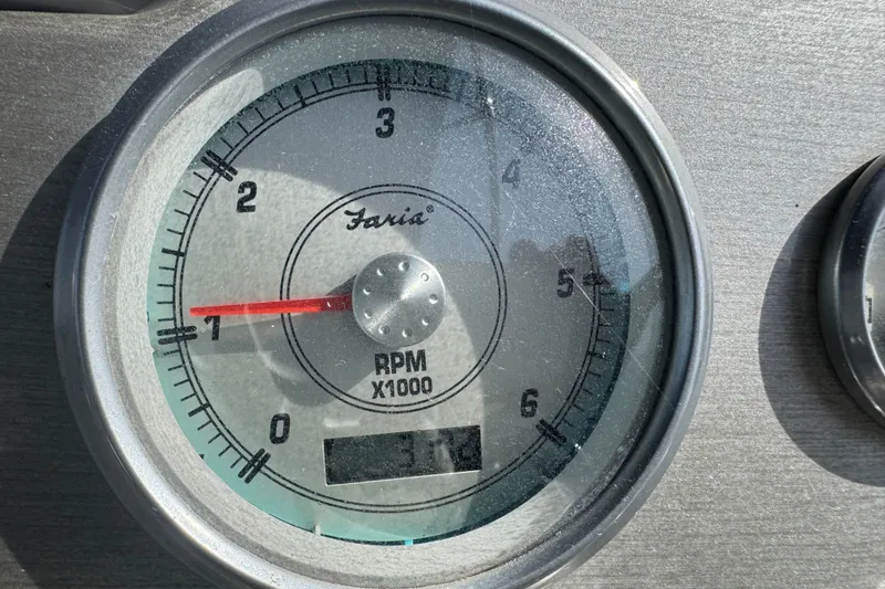 Slide: The Image of Tachometer of 2008 Cruisers Yachts 395 Motoryacht displaying RPM in thousands. - 26