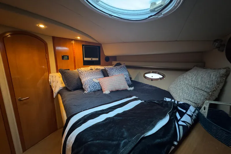 Slide: The Image of Luxurious cabin interior of 2008 Cruisers Yachts 395 Motoryacht with cozy bedding. - 51