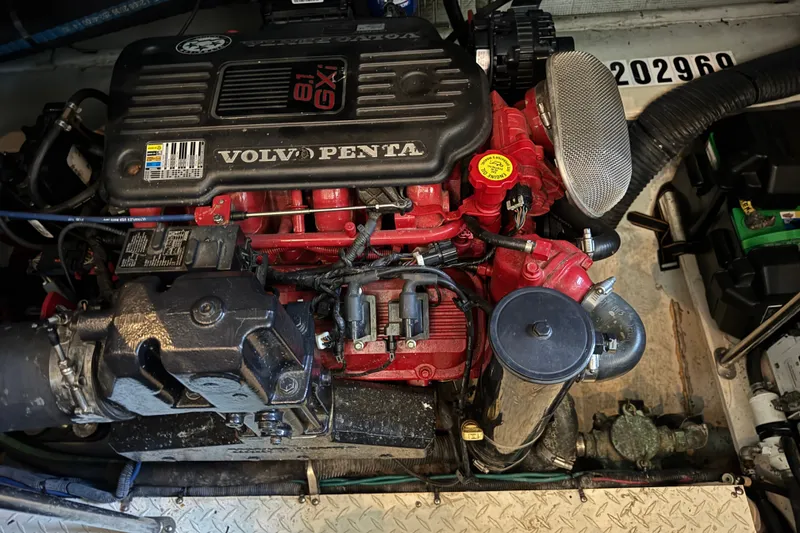 Slide: The Image of Volvo Penta engine in 2008 Cruisers Yachts 395 Motoryacht, showcasing mechanical components. - 59