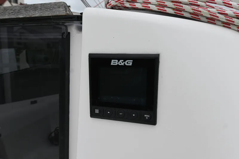 Slide: The Image of B&G display on 2022 Beneteau First 24 sailboat, featuring navigation controls. - 11