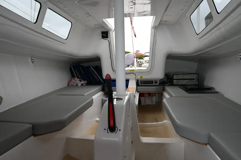 Slide: The Image of Interior of 2022 Beneteau First 24 sailboat, featuring sleek design and comfortable seating. - 23