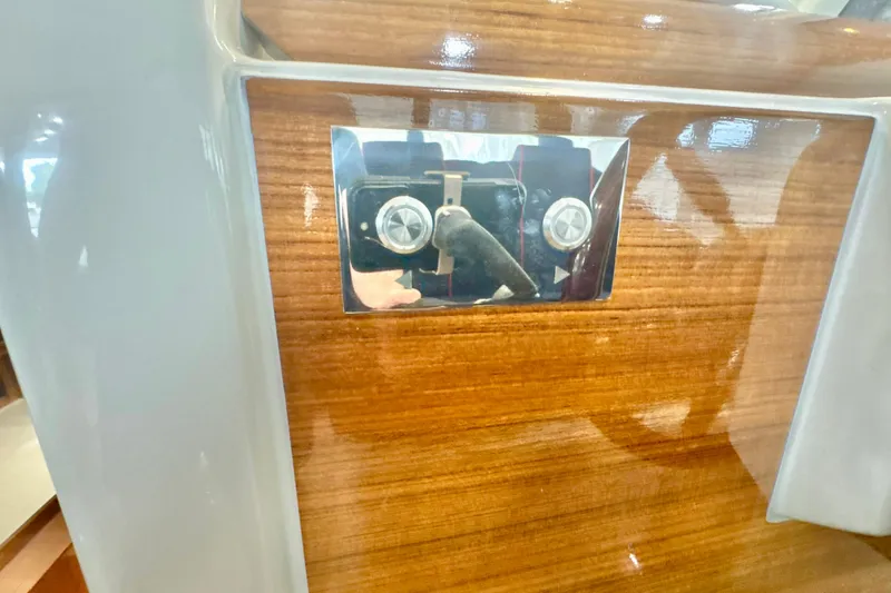 Slide: The Image of 2024 DaVinci 30HT boat interior with polished wood and chrome details. - 40