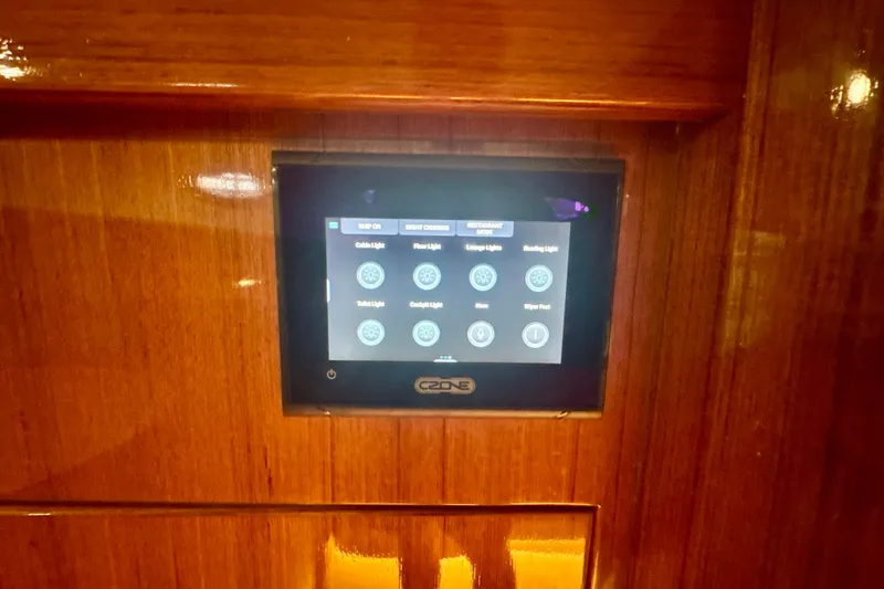 Slide: The Image of Touchscreen control panel on 2024 DaVinci 30HT yacht, displaying lighting and system options. - 46